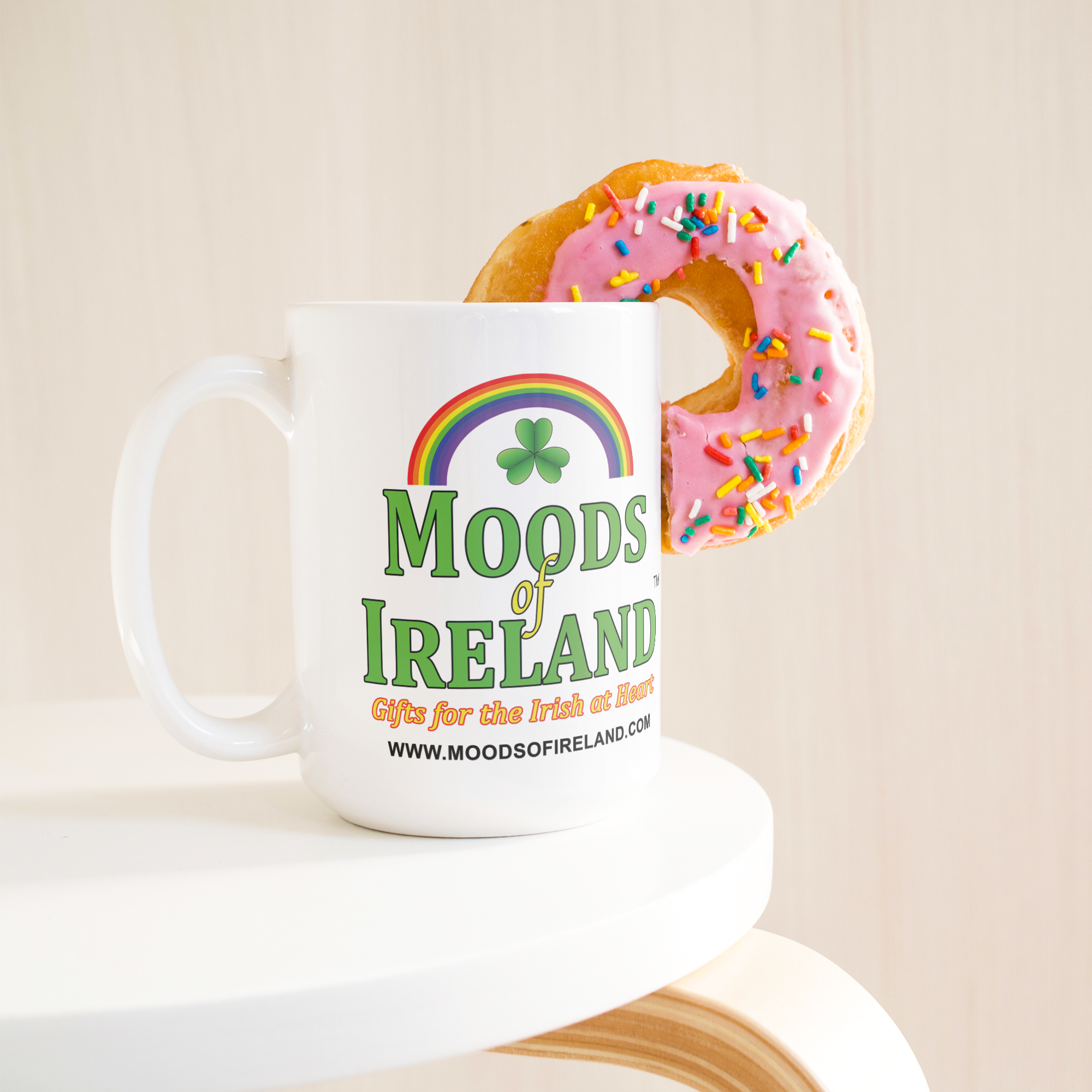 Moods_of_Ireland_15oz_Ceramic_Coffee__15ozWhiteMugLifetsyleDonutLH_Mockup.png