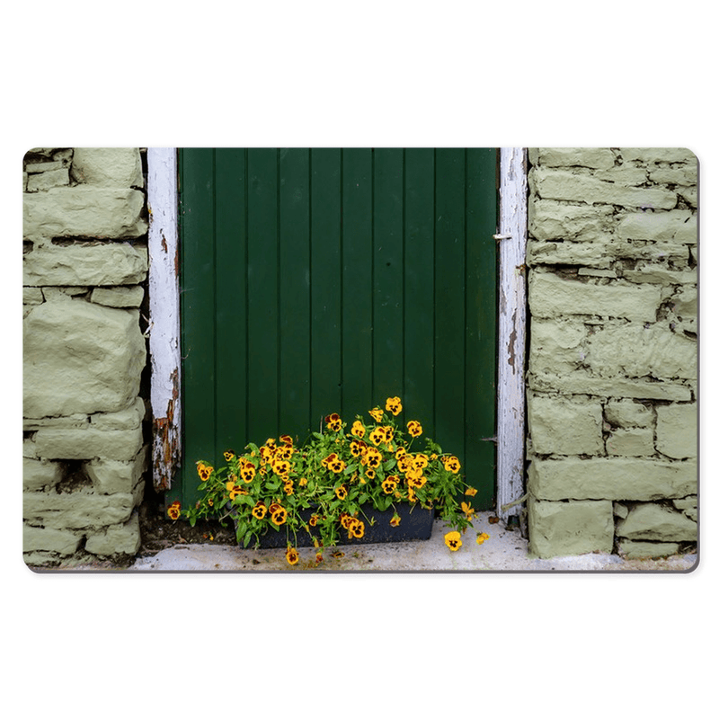 Desk Mat - Pansies and Painted Old Stone Building, Cooraclare, County Clare - James A. Truett - Moods of Ireland - Irish Art