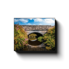 Canvas Wrap - Arched Bridge over Wildflower-lined Stream, County Clare - Moods of Ireland